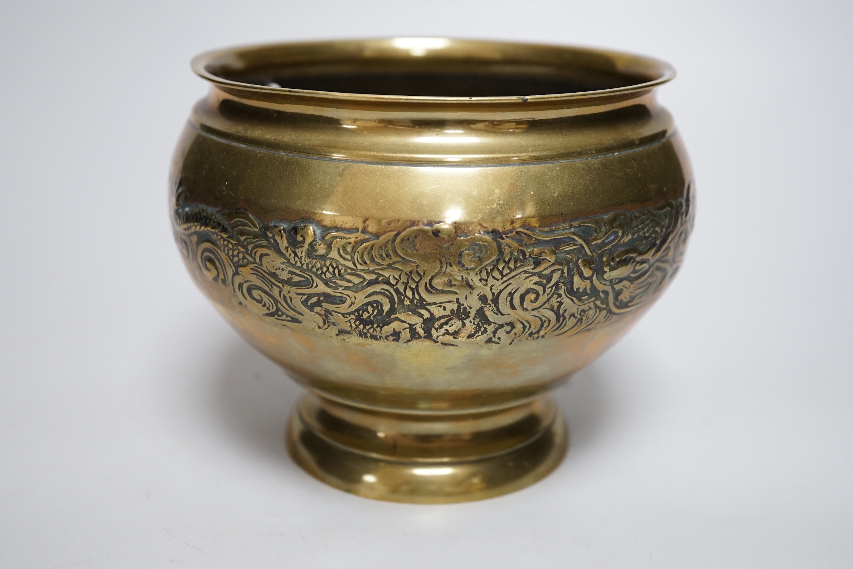 A Chinese brass bowl, 13cms high